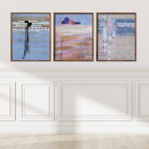 Hopeful Set of 3 mounted on wall by Alice Arlene Briggs, three abstract mixed media prints in rich blues — quiet and intentional, available framed in premium oak with real glass