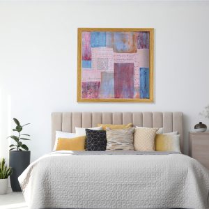 Latin A abstract art print by Alice Arlene Briggs in bedroom setting, contemplative mixed media collage in rich blues and reds, giclée on archival cotton paper